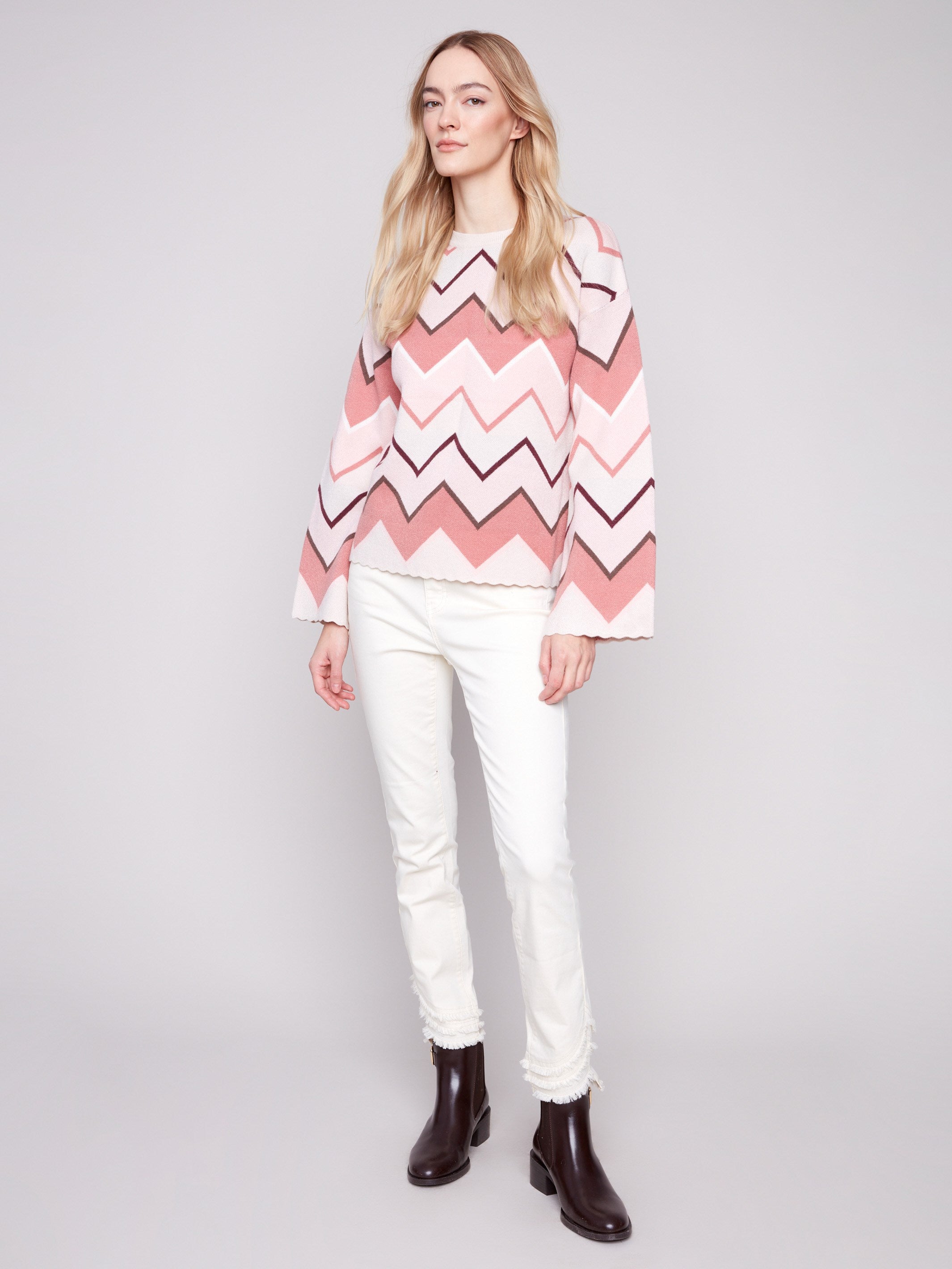 Chevron patterned sweater featuring elegant bell sleeves for a trendy and comfortable style by Charlie B.