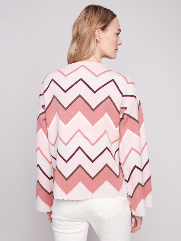 Sweater showcasing an eye-catching chevron pattern in ice cream hues, perfect for any casual outing by Charlie B.