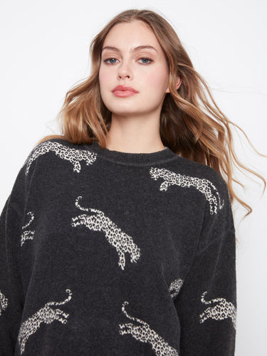 Zebra-patterned jacquard sweater with ribbed hem, offering a chic look by Charlie B.