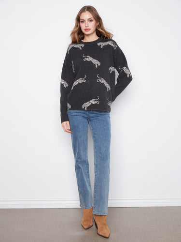 Wildcat pattern sweater showcasing a drop shoulder style for a relaxed fit by Charlie B.