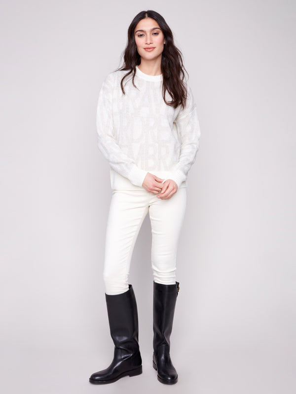 Cozy off-white jacquard sweater with long sleeves and refined ribbed cuffs for a polished look by Charlie B.