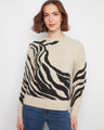 This sweater features a classic crew neck design, offering a timeless and versatile look for any wardrobe. By Charlie B.