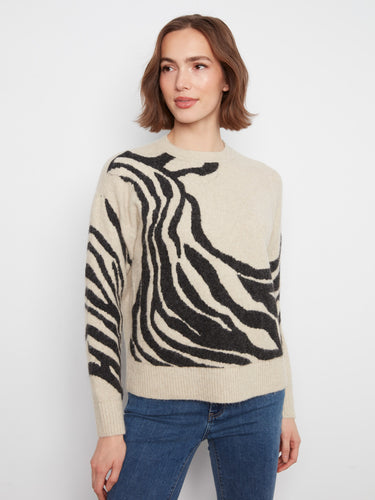 The drop shoulder design of this sweater creates an effortless silhouette perfect for casual wear. By Charlie B.