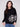 Black sweater with a jacquard floral pattern, showcasing a relaxed fit design and long sleeves for comfort by Charlie B.