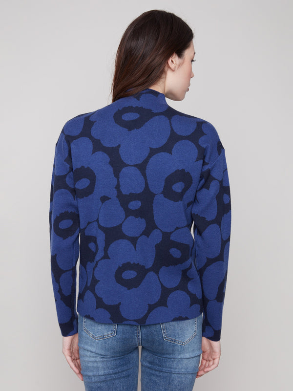 Elegant long sleeves enhance the blue aura floral-patterned jacquard sweater by Charlie B.