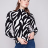 Zebra-patterned jacquard sweater featuring a chic mock neck and slim fit design, ideal for stylish layering by Charlie B.