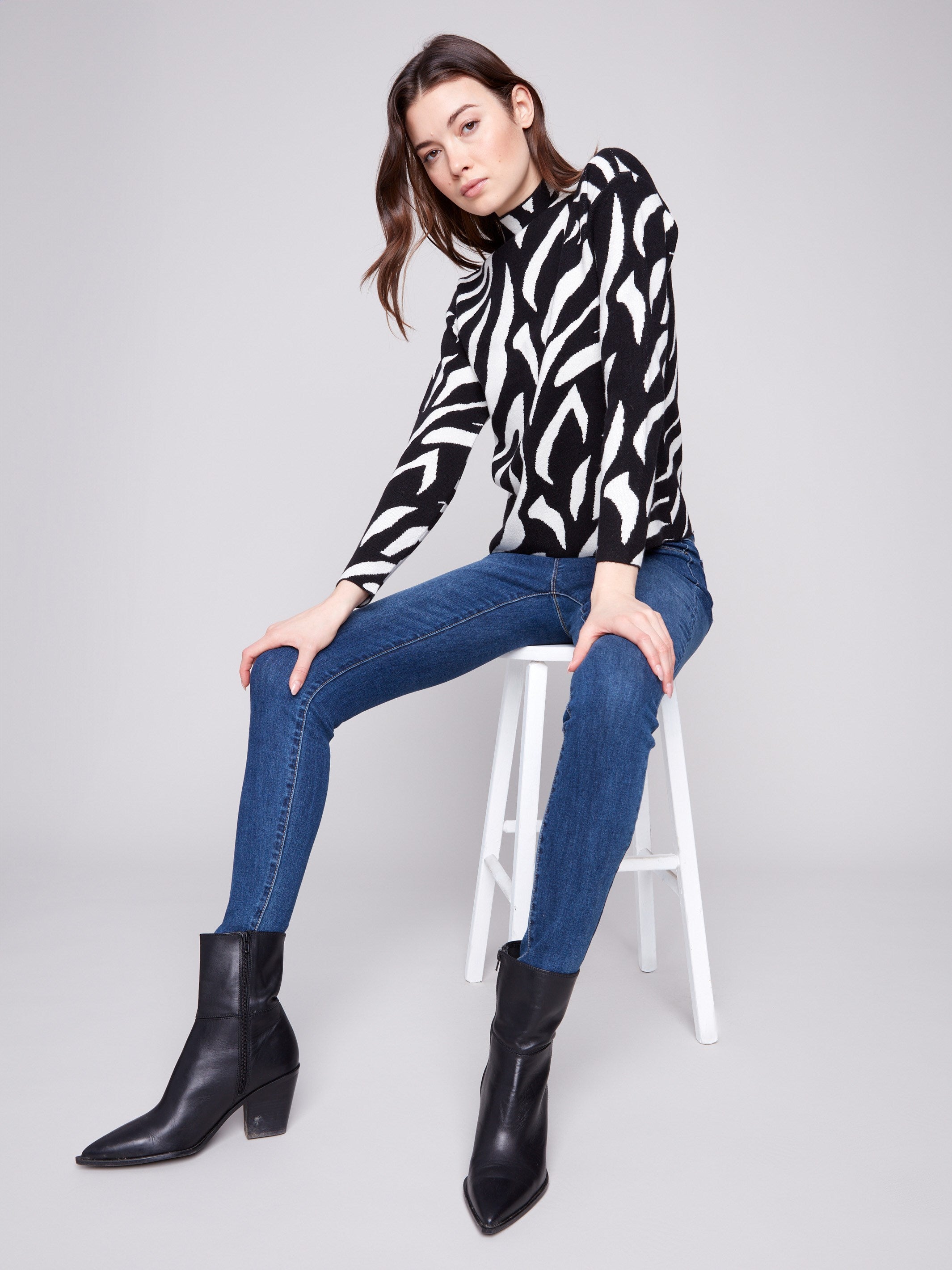 Stylish long-sleeved zebra-patterned jacquard sweater offering a modern look and cozy feel by Charlie B.