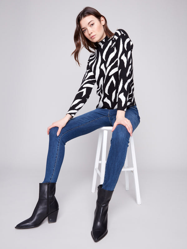 Stylish long-sleeved zebra-patterned jacquard sweater offering a modern look and cozy feel by Charlie B.