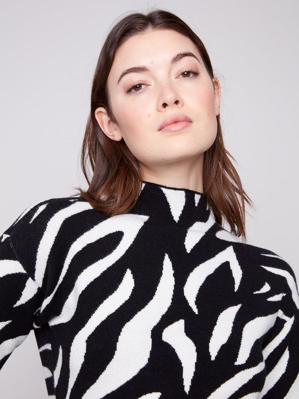 Slim fit jacquard sweater with bold zebra print, combining elegance with everyday wearability by Charlie B.