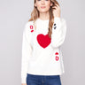 White plush knit sweater with a crew neck and Queen of Hearts design, featuring bold red graphics by Charlie B.