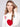 Long sleeve white sweater featuring ribbed cuffs and a prominent red heart design by Charlie B.