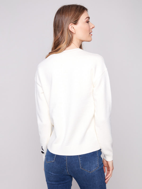 Elegant ribbed hem on this plush knit sweater with the iconic Queen of Hearts motif by Charlie B.