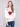 Chic white sweater showcasing a crew neck and vivid red heart graphic in the Queen of Hearts theme by Charlie B.