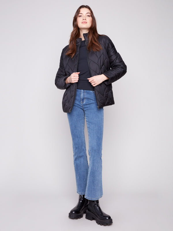 Modern black puffer with distinctive zip front closure for easy wear and contemporary flair by Charlie B.