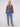 Stylish navy blue sweater featuring folded cuffs and an intricate jacquard design by Charlie B.