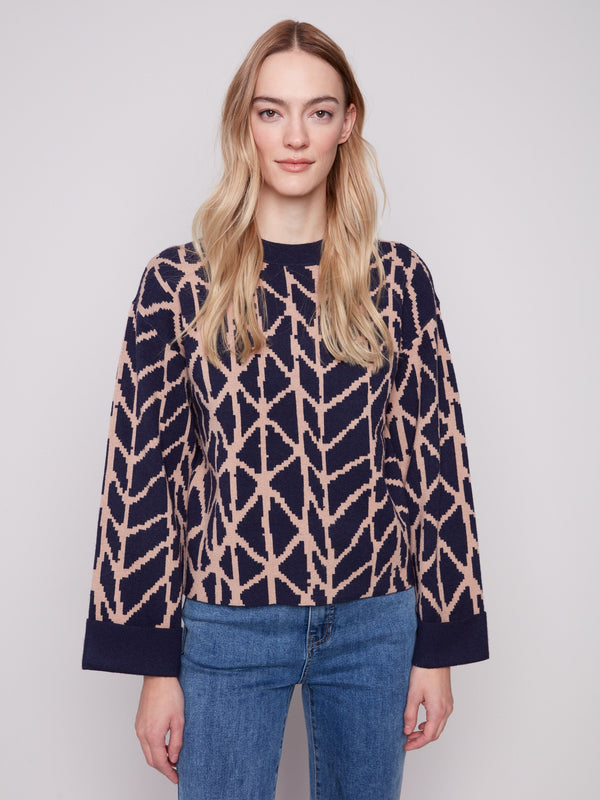 Chic navy blue jacquard sweater highlighting its relaxed fit and stylish design by Charlie B.