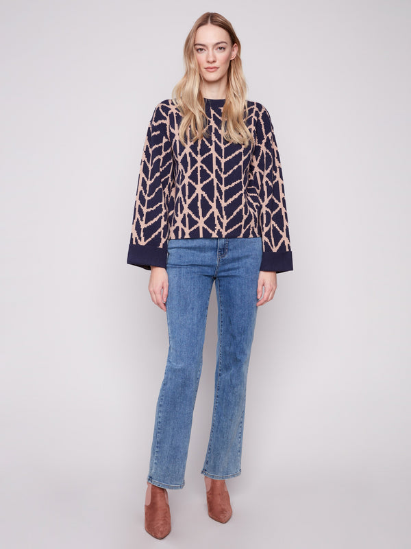Navy sweater with folded cuffs, offering both style and comfort in a modern look by Charlie B.