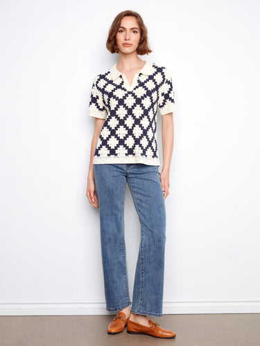 Stylish navy and cream crochet top with a Johnny collar, showcasing its unique design by Charlie B.