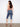 Trendy medium blue knee-length capris showcasing a regular rise and classic styling by Charlie B.