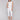 White capri pants with a knee-high cropped design by Charlie B.