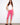 These vibrant pink pants feature a slim fit design with a flattering knee length, perfect for casual outings. By Charlie B.