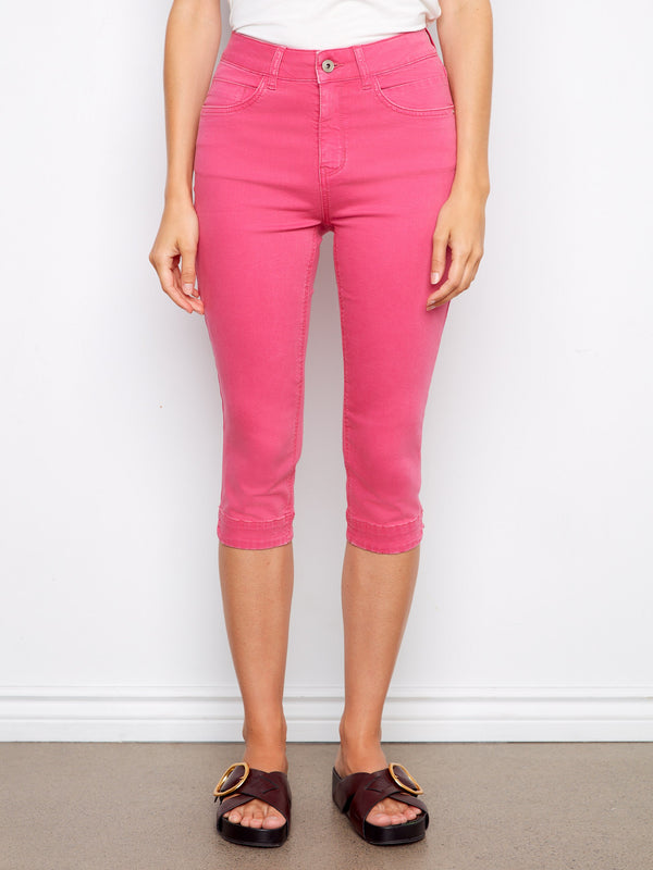 Ideal for versatile styling, the knee-length cut of these pink pants makes them a must-have addition to any wardrobe. By Charlie B.