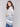Denim-hued cardigan showcasing a knit fabric and long sleeves by Charlie B.