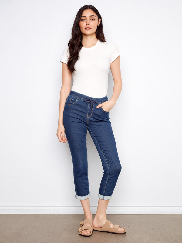 These indigo jogger pants feature a five-pocket design, adding practicality to the stylish slim-fit look by Charlie B.