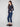 Stylish denim pants with a five-pocket design and rolled cuffs, ideal for versatile wear by Charlie B.