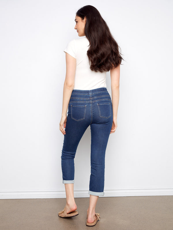 Rolled cuffs add a touch of casual elegance to these indigo knit denim jogger pants by Charlie B.