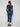 Indigo denim joggers showcasing back pockets and rolled cuffs, combining style with practicality by Charlie B.