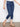 The slim fit of these indigo denim joggers provides a flattering silhouette for any occasion by Charlie B.