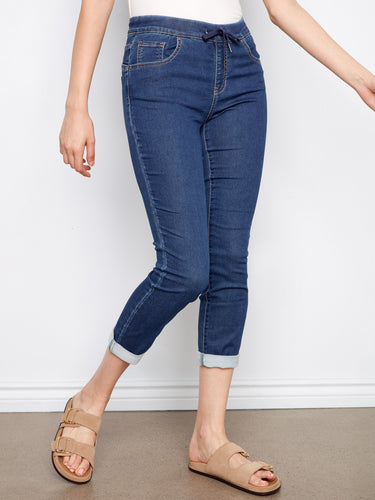 The slim fit of these indigo denim joggers provides a flattering silhouette for any occasion by Charlie B.