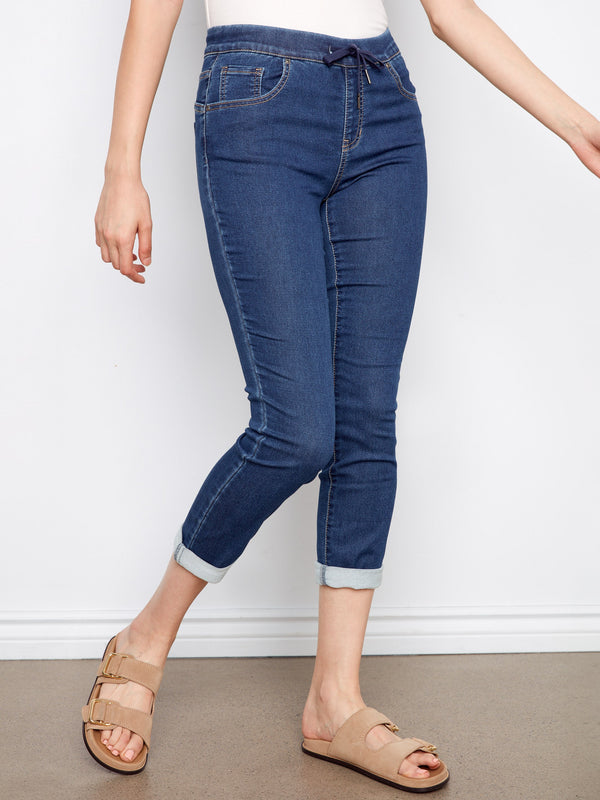 The slim fit of these indigo denim joggers provides a flattering silhouette for any occasion by Charlie B.