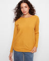 Sweater featuring a stylish boat neck neckline, perfect for casual outings. Designed with comfort in mind. By Charlie B.