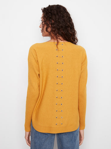 Chic sweater showcasing eyelets detail at the back, adding a unique touch to your wardrobe. A must-have piece by Charlie B.