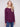 Berry knit sweater featuring a chic boat neck design and rounded hem by Charlie B.