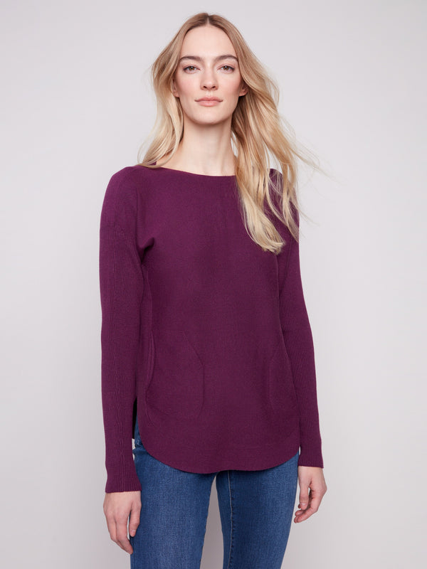 Berry knit sweater featuring a chic boat neck design and rounded hem by Charlie B.