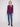 Elegant berry knit sweater with long ribbed sleeves and stylish front pockets by Charlie B.