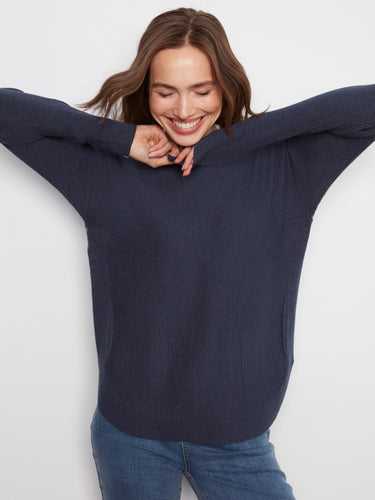 Comfortable long ribbed sleeves on this heather moss knit sweater offer warmth and style by Charlie B.