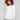 Ecru knit sweater featuring a stylish boat neck and round hem, perfect for any occasion by Charlie B.