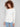 Ecru knit sweater featuring a stylish boat neck and round hem, perfect for any occasion by Charlie B.
