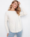 This chic sweater features a stylish boat neck, adding elegance to any casual outfit. Designed by Charlie B.