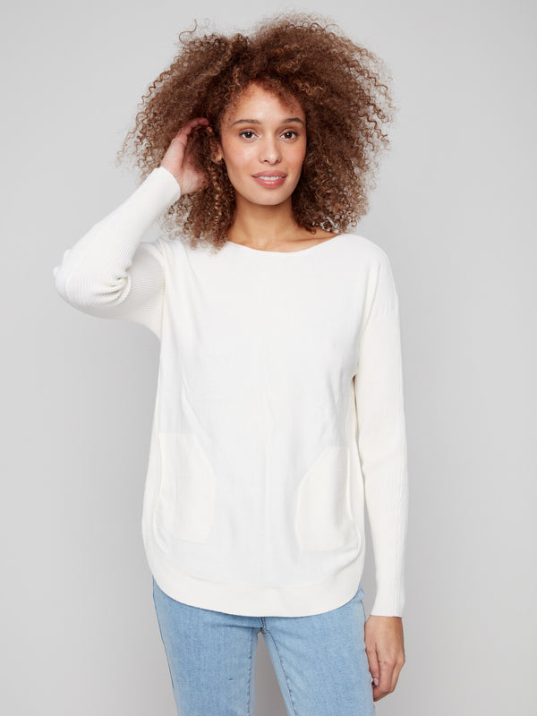 Elegant ecru knit featuring a versatile boat neck design, ideal for both casual and formal settings by Charlie B.