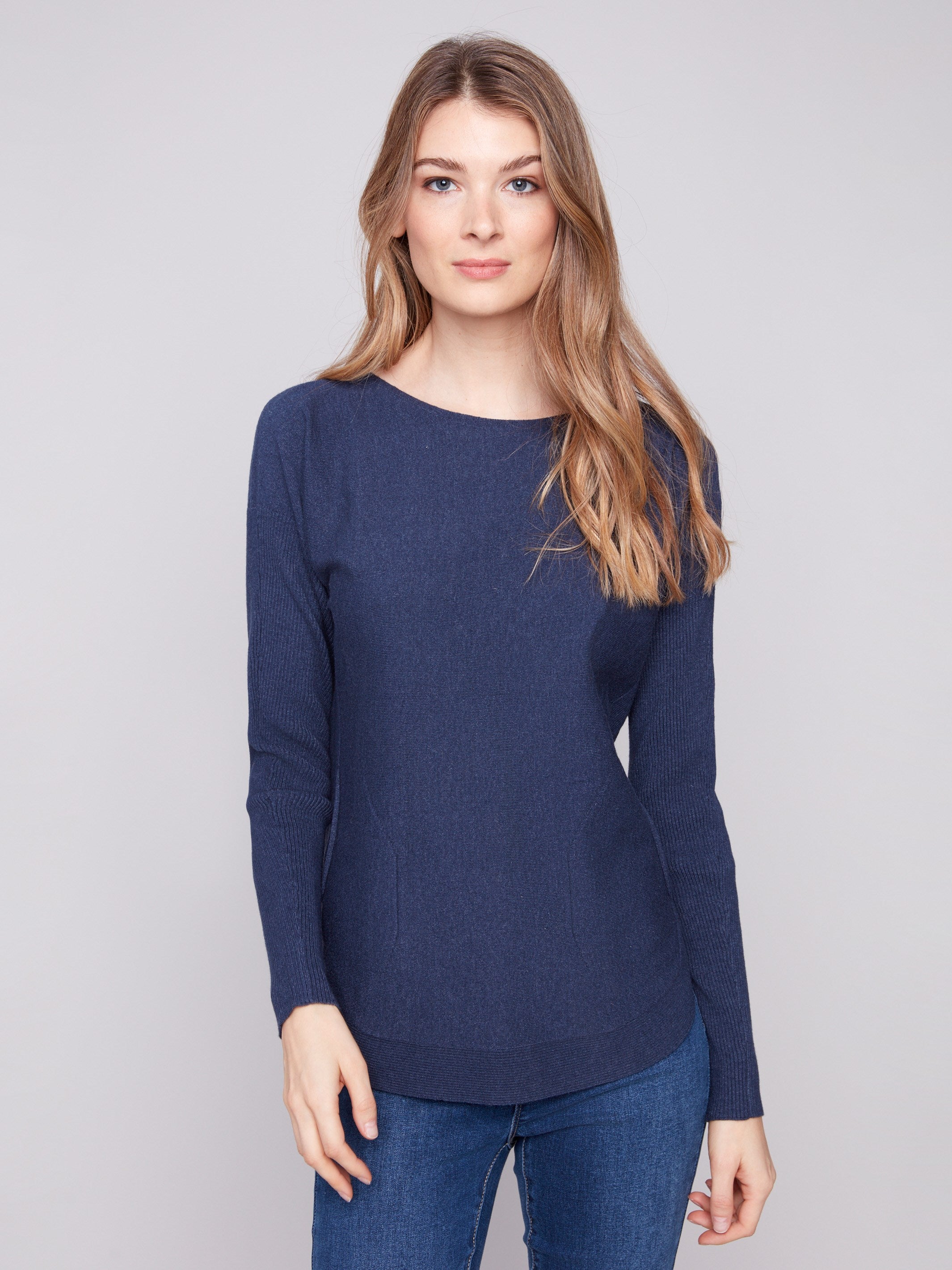 Heather denim knit sweater featuring a stylish boat neck design for a casual look by Charlie B.