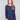 Heather denim knit sweater featuring a stylish boat neck design for a casual look by Charlie B.