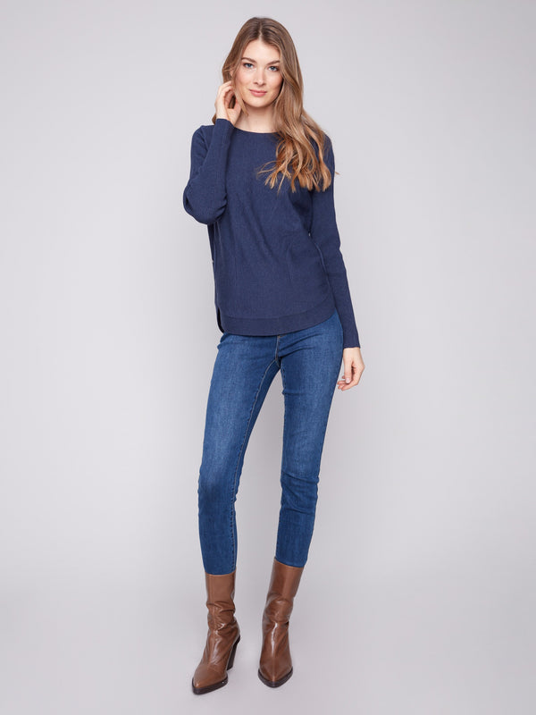 Sweater crafted with long ribbed sleeves, offering both comfort and style in heather denim by Charlie B.