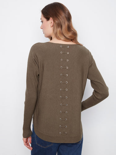 Back lace-up eyelet details enhance the design of this sweater, offering a unique and trendy appeal. Made by Charlie B.