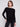 Black knit sweater featuring a stylish boat neck and rounded hem by Charlie B.