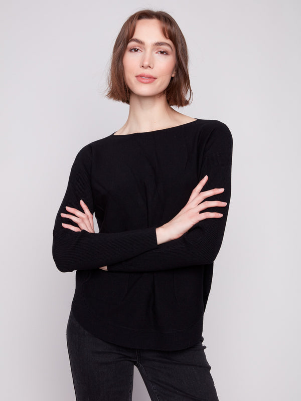 Chic black knit sweater with long ribbed sleeves, perfect for any occasion by Charlie B.